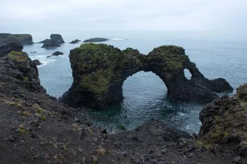 Arnarstapi basalt rock arch formation, Iceland Stock Photos