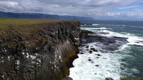 Arnarstapi basalt rocks  in atlantic ocean in Iceland Stock Footage 318728637