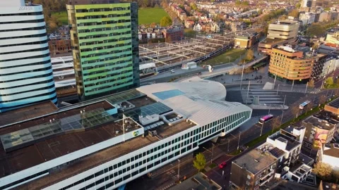 Arnhem Centraal station transfer terminal by UNStudio with curvilinear roof and Stock Footage 334697937