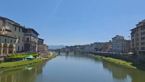 The Arno River and Ponte Santa Trinita in Florence, Italy Stock Footage 344669937