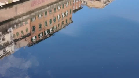 Arno River Reflection in Pisa - Building Reflection on Water. Stock Footage 329959564