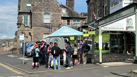 ARNSIDE, UK 19 June 2024; River Kent Estuary, Village and shops Stock Footage 277748024
