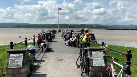 Arnside, UK 19 June 2024; River Kent Estuary, Pier and sands at low tide Stock Footage 277748109