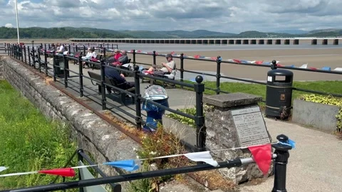 Arnside, UK 19 June 2024; River Kent Estuary, Pier and sands at low tide Stock Footage 277748172