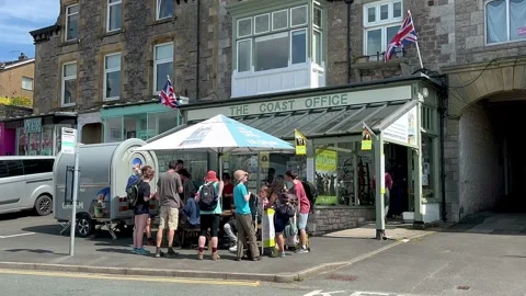 ARNSIDE, UK 19 June 2024;  River Kent Estuary, Village and shops Stock Footage 277748218