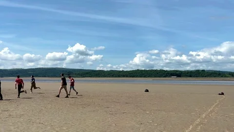 ARNSIDE, UK 19 June 2024; River Kent Estuary, Pier and sands at low tide Stock Footage 277796917