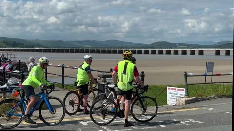 Arnside, UK 19 June 2024; River Kent Estuary, Pier and sands at low tide Stock Footage 277796944