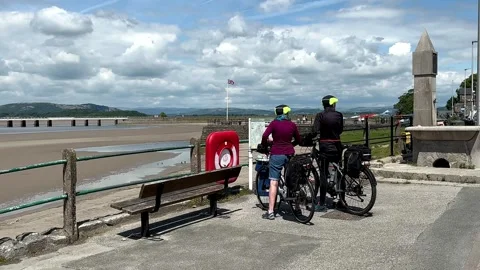 Arnside, UK 19 June 2024; River Kent Estuary, Pier and sands at low tide Stock Footage 277796972