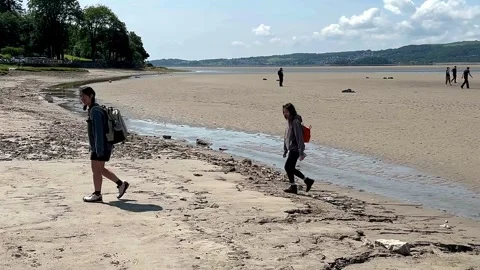 Arnside, UK 19 June 2024; River Kent Estuary, Pier and sands at low tide Stock Footage 277796978