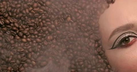 Aroma coffee beans around of face beautiful young woman and light steam. Stock Footage 132311853