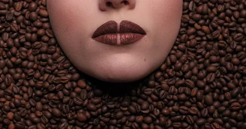 Aroma coffee beans around of face beautiful young woman. Stock Footage 132311902