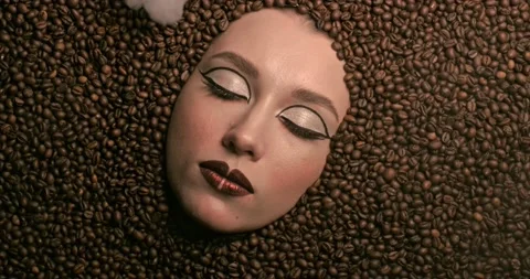 Aroma coffee beans around of face beautiful young woman. Stock Footage 132312938