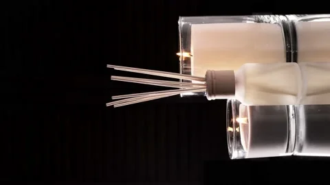 Aroma diffuser and scented candles that create coziness in the house. Video stock 221127986