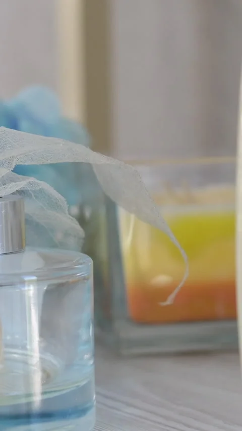 Aroma diffuser. Aroma scented reed diffuser glass is on the tray with scented Stock Footage 278216108