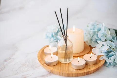Aroma diffuser, candles and space for text Stock Photos