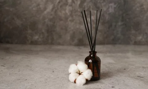 Aroma diffuser with cotton. Aromatherapy on a dark marble background Stock Photos