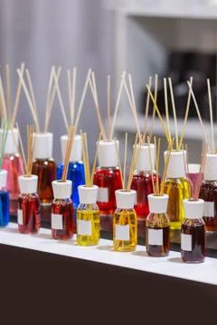 Aroma diffuser different colors in the store. Air fragrances in the form of l Stock Photos