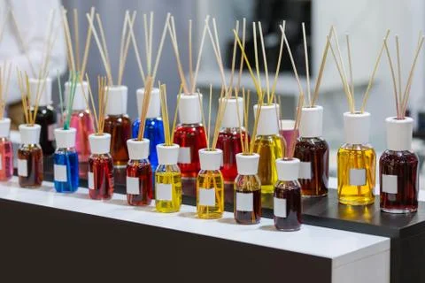 Aroma diffuser different colors in the store. Air fragrances in the form of l Stock Photos