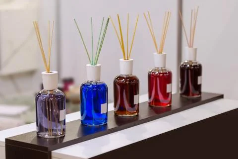 Aroma diffuser different colors in the store. Air fragrances in the form of l Stock Photos
