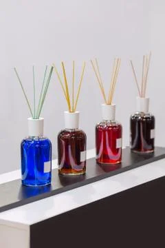 Aroma diffuser different colors in the store. Air fragrances in the form of l Stock Photos