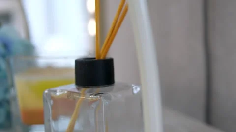Aroma diffuser. home improvement, decoration and people concept - woman placing Stock Footage 278206288