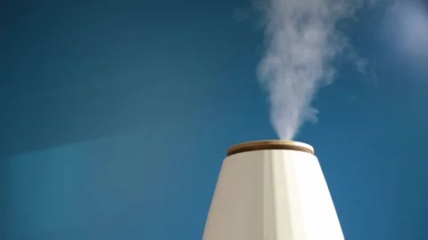 Aroma diffuser, humidify air, vaporize water, closeup of ultrasonic vapor, .. Stock Footage 262145491