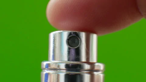 Aroma diffuser spray, puff with toilet water button on a green. Chroma key 스톡 동영상 249328538