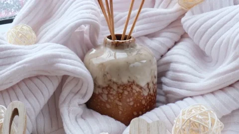 Aroma reed diffuser. Bottle container with wood stick diffusers Essential oils Stock Footage 239964377