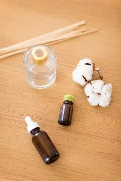Aroma reed diffuser, essential oil and cotton flower Stock Photos