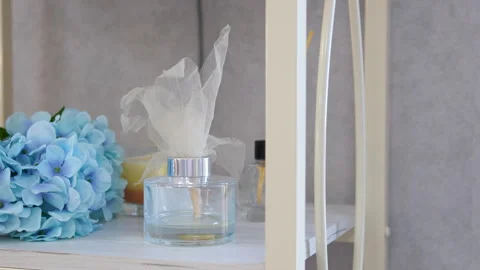 Aroma scented reed diffuser glass is on the tray with scented Perfume flavor Stock Footage 278504741