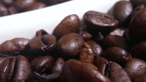 Aroma Unleashed: Macro Close-Up of Freshly Roasted Coffee Beans in Detail Stock Footage 255328080