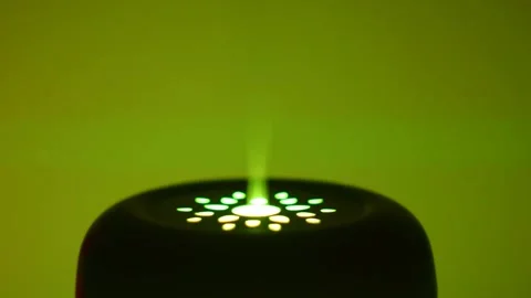 An aromatherapy diffuser changing colours whilst emmitting aroma smells. Stock Footage 267280359