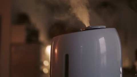 Aromatherapy diffuser for the room stands on the table. Stock Footage 325337129