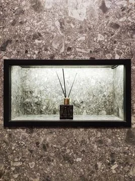 Aromatherapy reed diffuser or air freshener bottle on shelf Stock Photos