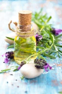 Aromatherapy spa background with a sprig of fragrant lavender with essential oil Stock Photos