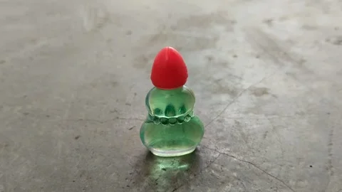 Aromatherapy wind oil is packaged in a small glass bottle Stock Footage 296864948