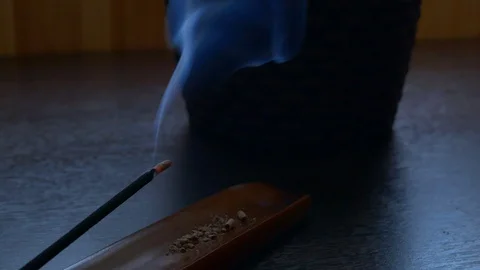 Aromatic biotic material burning for meditation purpose Burned fragrant incense Stock Footage 107889123