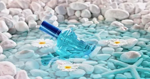 Aromatic blue perfume in environment of white stones and sea. Stock-Footage 334611227