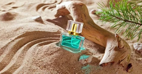 Aromatic blue perfume smelling of summer and holidays. 動画素材 332251411