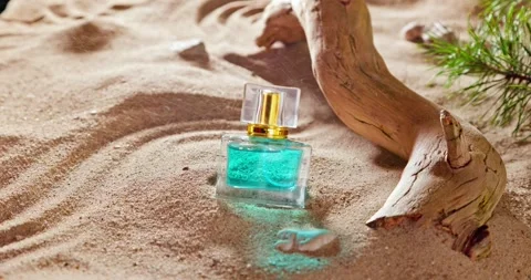 Aromatic blue perfume smelling of summer and holidays. 動画素材 332622127