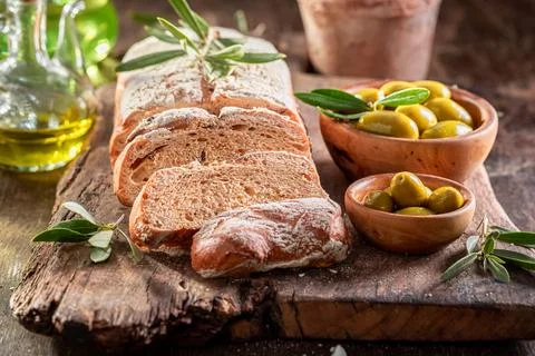 Aromatic bread with extra virgin olive oil. Stock Photos