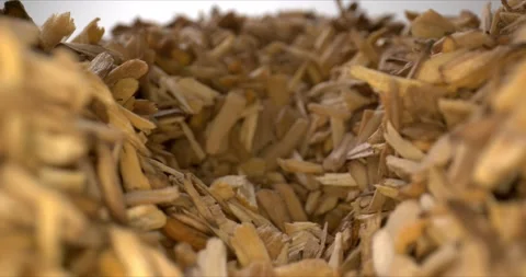 Aromatic brown bark on a light background. Fuel for fireplace. Close-up of wood 스톡 동영상 148925025