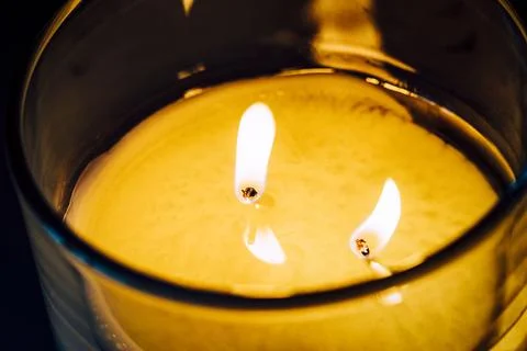 Aromatic candle with two wicks Stock Photos