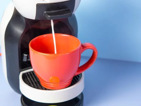 Aromatic cappuccino from a capsule coffee machine Stock Photos