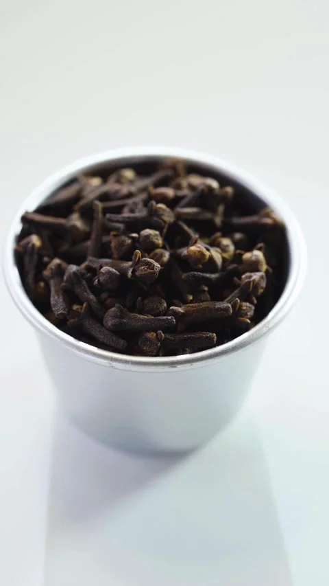 Aromatic Cloves Spinning In Front Of White Background Stock Footage 331763481