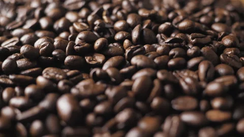 Aromatic coffee beans close-up. Camera movement, grain inspection Stock Footage 266395751