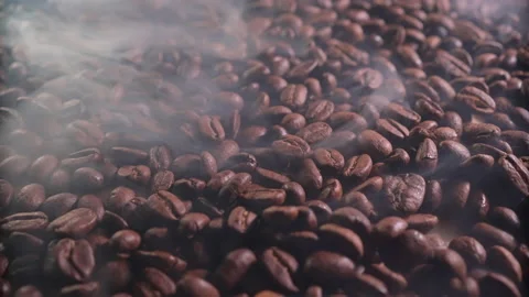 Aromatic coffee beans in the roasting process with the presence of a small am Stock Footage 170866422