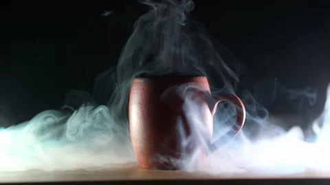 Aromatic coffee. beautiful ceramic mug with an invigorating drink on a dark b Stock Footage 170868405