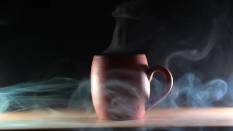 Aromatic coffee. beautiful ceramic mug with an invigorating drink on a dark b Stock Footage 170868437