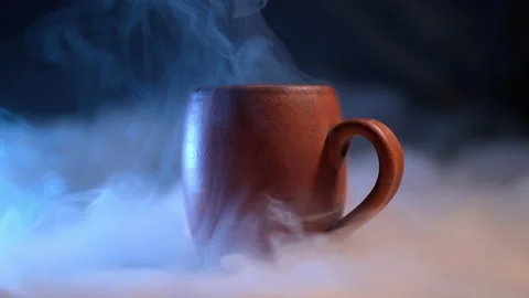 Aromatic coffee. beautiful ceramic mug with an invigorating drink on a dark b Video stock 170868744